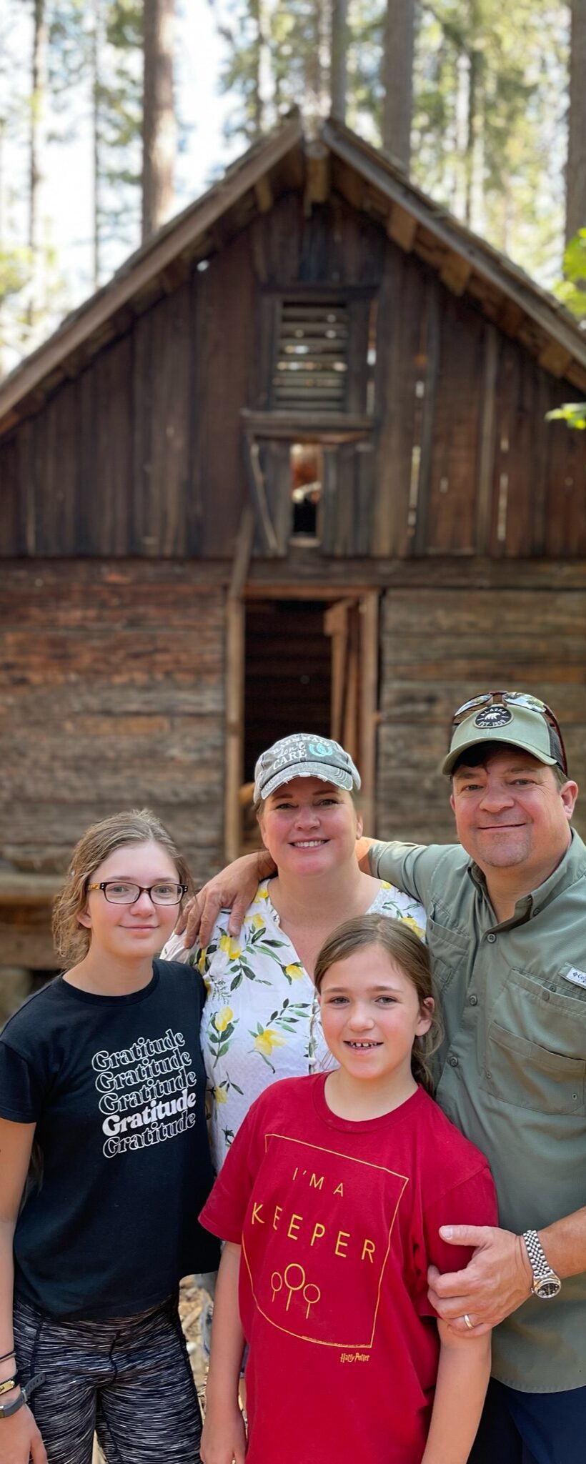 Tourists exploring giant sequoias with guide at Yosemite National Park